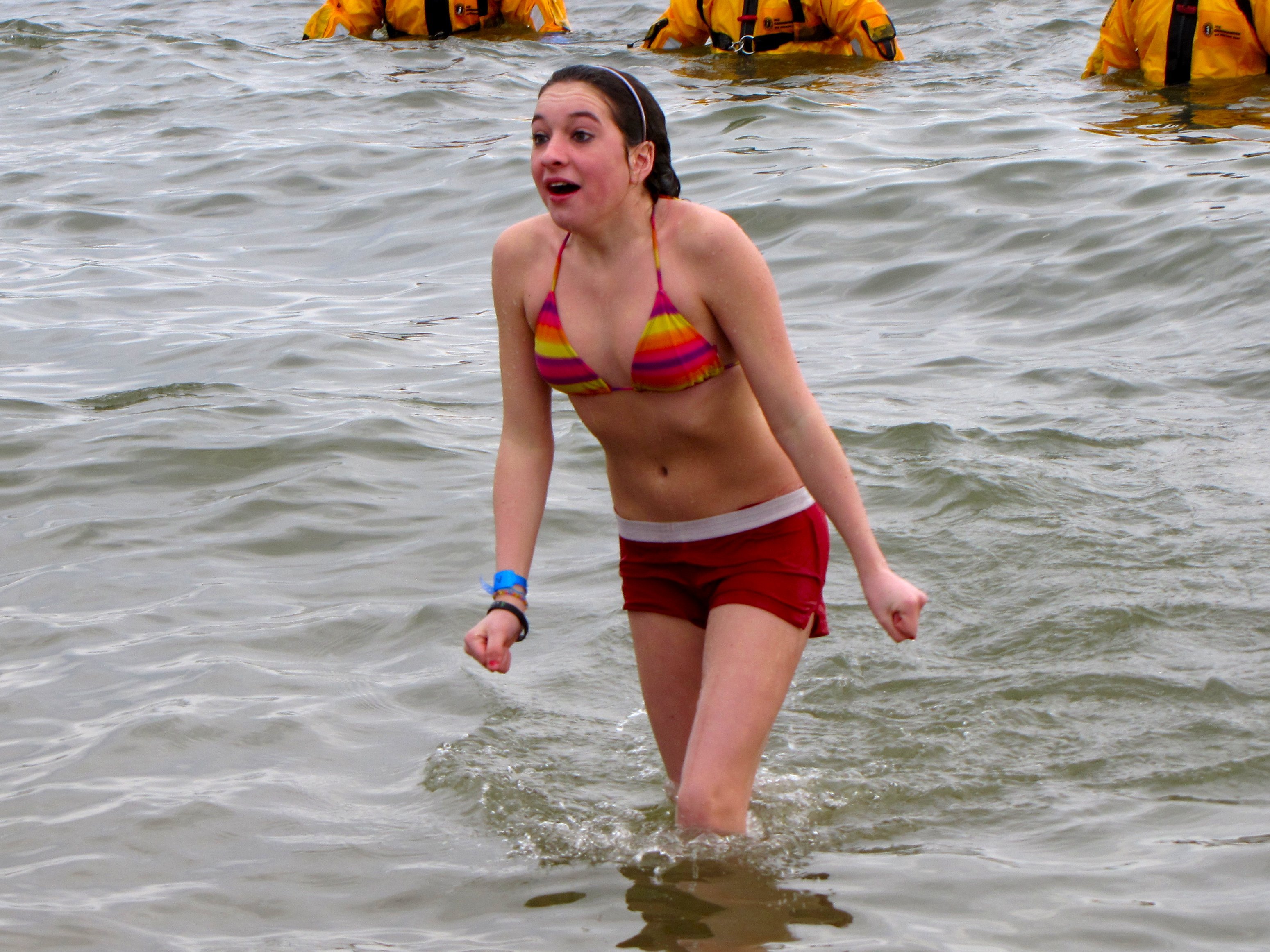p A woman makes a face as she emerges from the Chesapeake Bay during the 20...
