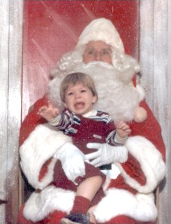 Ben Schumin on Santa Claus' lap for the first time