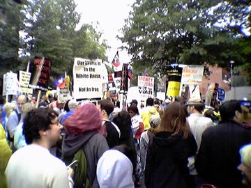 Approaching Donald Rumsfeld's house. Police initially did not let the entire crowd through for purposes of crowd control, as Kalorama Road is not a particularly large street. The police eventually relented, and opened the gates. Meanwhile, we all began yelling, "WHOSE STREETS? OUR STREETS!"