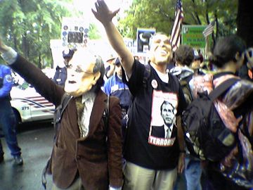 Some people really dressed up to make their point. These two wore masks designed to look like George W. Bush and Donald Rumsfeld, and likened them to Nazis by giving the Nazi salute while wearing the masks.