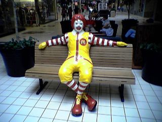 Ronald McDonald hogs one of the benches at Valley Mall