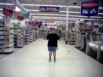 Standing on the new tile at the Wal-Mart in Woodstock