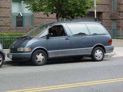 I was very surprised to run into what was basically a dead ringer for my old van, which you may recall was a Toyota Previa. My Previa was junked when I got rid of it, but this was like a glimpse back for a moment. It was the same color, and had the same spoiler and everything. One big difference: This Previa had all its hubcaps, while mine had lost three hubcaps over the course of fifteen years. Still, it was enough to make me do a double take.