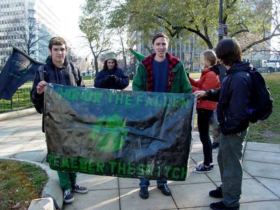 And as you can see, we had green and black flags at our march, as well as a banner.