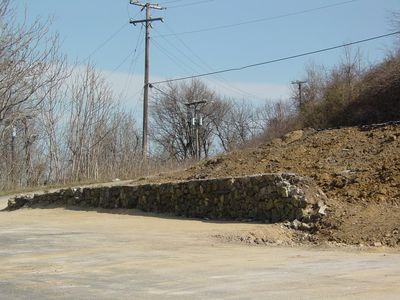 Some features, such as this retaining wall, were not demolished.