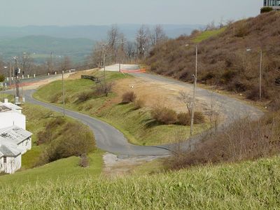 Aerial view of the now-empty property, viewed from the hill leading to The Inn at Afton. Compare this photo to this similar view of the area from 2003, before the fire.