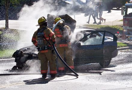 Spraying foam on the fire.