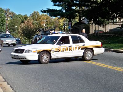 Montgomery County Sheriff's Department vehicle blocking the street to keep traffic from passing through. The street was blocked off from Georgia Avenue to the vacant lot, and traffic on my street was being turned back away from Georgia Avenue.