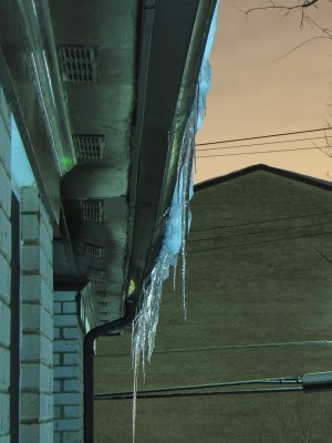 Icicles hanging from the roof of my apartment building.