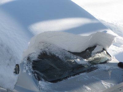 Snow on the back of a car