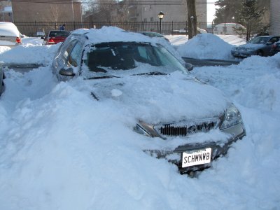 And then on the passenger side, the snow is piled up just about to the hood.