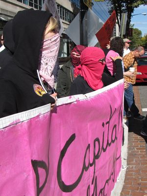 Pink-and-black bloc on its way