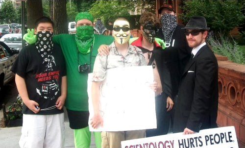 Group photo, with a bunch of us posing in our masks outside the Org. I am shown here in my "alternate" mask. When I wasn't wearing the zentai hood, I simply wore a second green bandanna to maintain the "anonymous" look.