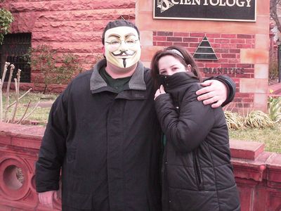 My coworker also showed up again, and struck an anonymous pose, while I smiled under my Guy Fawkes mask.