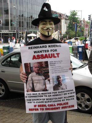 Meanwhile, Enturb held up a homemade wanted poster for Reinhard Koenig, the alleged kicker in the Ron Jeremy incident, who, at the time this photo was taken, was still at large.