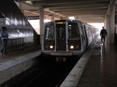 New Carrollton train arrives on center track.