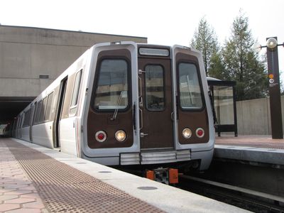 Alstom train on center track, waiting to leave.