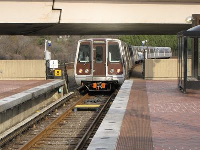 Same train, departing on center track.