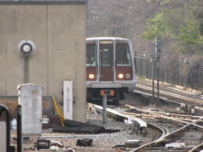 Short-turn train waiting on yard lead track after offloading.