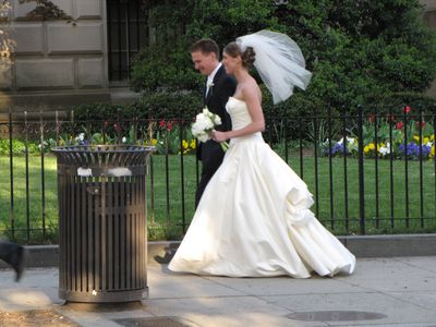 Just-married couple across the street.