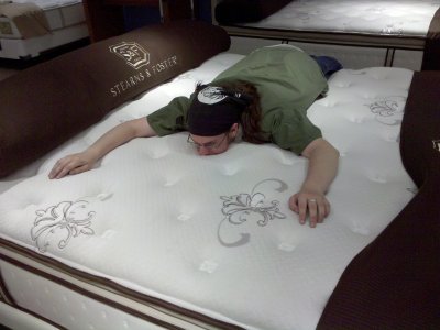 No better thing to do than take a nap, as Anyman demonstrates at the Macy's furniture store.