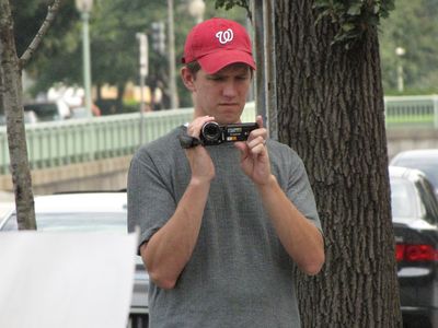 Scientology videographer in action