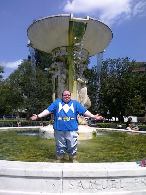 All smiles while standing in the fountain.