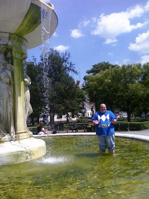 All smiles while standing in the fountain.