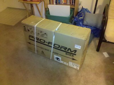 The exercise bike, still boxed up (but in the house!)