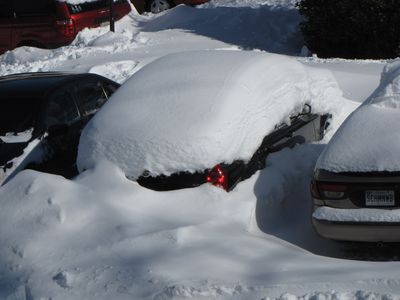 Yeah, I don't think that this car has moved since the first snowfall on Friday, and so I'm sure it's pretty much blocked in with packed snow, plus there's the whole thing of having to clear about three or so feet's worth of snow off the top of it.