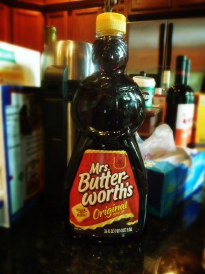 A bottle of Mrs. Butterworth's syrup