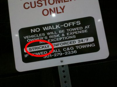 Detail of the sign, with the spelling error circled