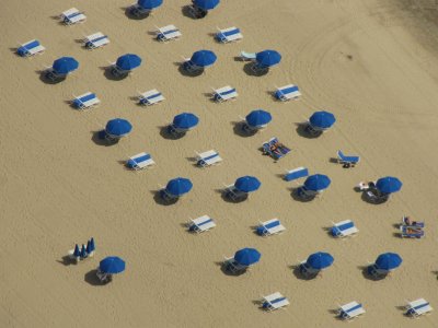 Umbrellas on a lakefront beach