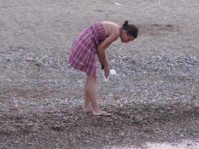 The girl in the pink appeared to be looking for something, but unfortunately, I couldn't figure out just what she was looking for.