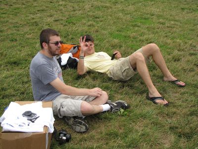 Jon and Jory sit on the grass.