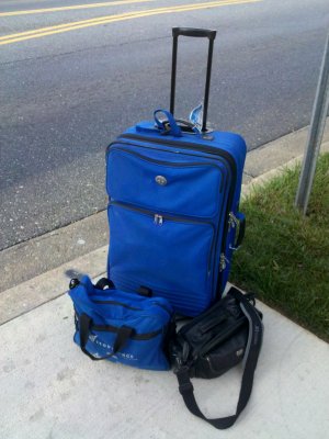 And there you go - my big suitcase, my work bag, and my camera bag, waiting neatly at the bus stop. All saw quite a bit of use by the end of the trip.