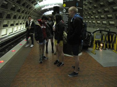 Waiting on a station platform for another train... with no pants on.