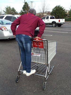 And then speaking of Mom, yes, she is doing exactly what you're thinking she's doing. She is riding the cart down the parking lot at Costco. Mom is small enough that she can ride the cart down the lot unloaded. I can't do that. Fully loaded, maybe, but I'm too mature to engage in such antics. Mom, meanwhile, even went so far as to say that you can be immature forever. And there you go, I suppose. Still riding the cart down the lot at sixty years old.