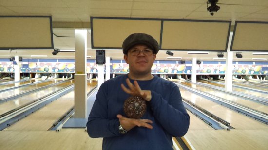 Doing something with my hands on the bowling ball