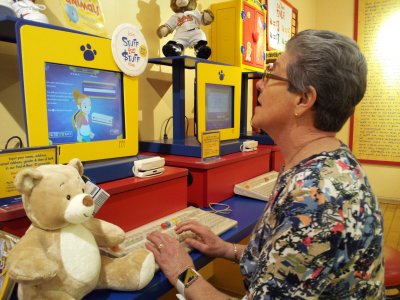 Mom registers the bear to get its birth certificate.