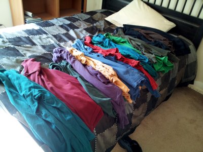 A whole bunch of shirts that I can't wear anymore