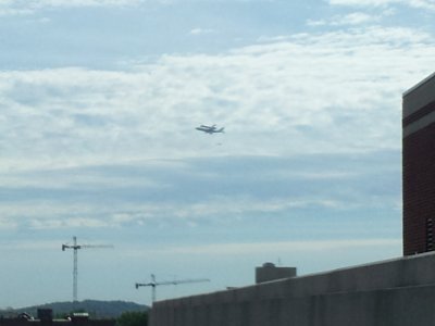 Discovery to the east of our position. 1400 16th Street NW is visible in the lower right corner. Discovery is traveling from right to left as seen from this vantage point.