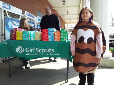 Girl scouts, dressed as cookies and selling cookies