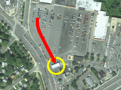 That is a Google Earth image of Glenmont Plaza, showing how the gas line went.  The gas station canopy is circled in yellow.  The red line follows how the traffic was lined up waiting to get gas.  The Staples is the white patch near the top center of the image.