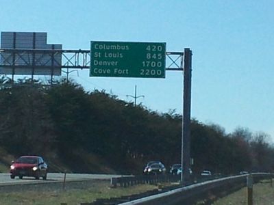 So now it's on the back of an overhead sign gantry. How interesting! Does anyone know when that sign was moved from the median to the overhead?