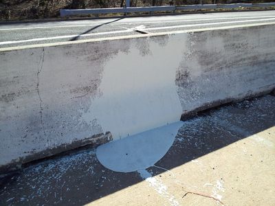 More paint on the Jersey barrier next to the other paint blob.