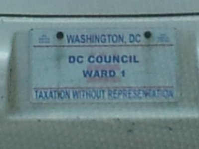 Detail of the first image, showing Jim Graham's special DC Council license plate.