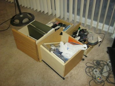 The drawers from the old desk, still full of junk