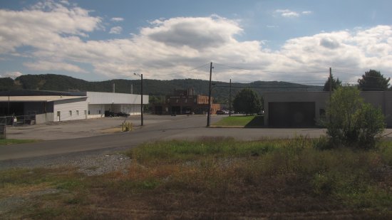 Wayne Avenue.  The fire department building is the brick building in the center photo, and the white building to the left is the former Moore's building.