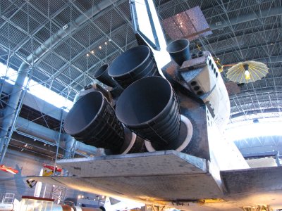 Space Shuttle Main Engines (SSMEs) on Discovery - the real thing.  Note how the SSME nozzles on Discovery have rings on the outside, while the simulated SSME nozzles on Enterprise were smooth.